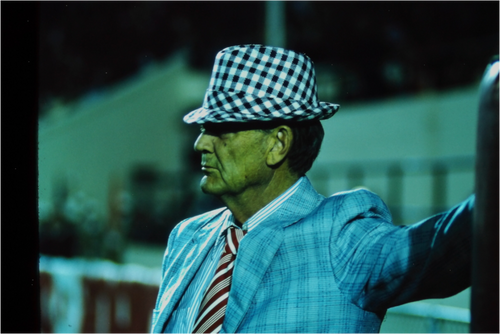 Main image Coach Paul Bear Bryant Leaning Against the Goal Post - Photo under Acrylic Glass
